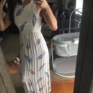 Cream open back feathered dress